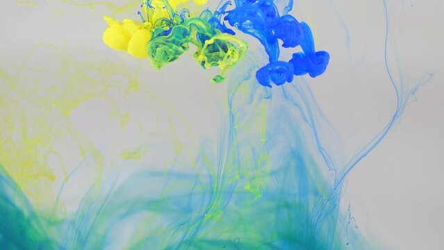 Liquid Abstractions, The Dissolution Of Blue And Yellow Paint In Water.