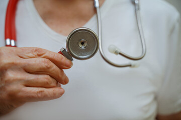 Medical background doctor stethoscope. Happy nurse in hospital uniform, hands with stethoscope isolated on white. Medical care and healthcare concept