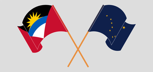 Crossed flags of Antigua and Barbuda and the State of Alaska. Official colors. Correct proportion