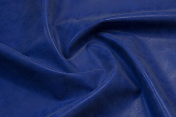 Naklejka na ściany i meble blue artificial leather with waves and folds on PVC base