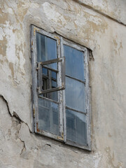 an old window in a wall