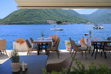 Summer cafe overlooking the sea in Perast