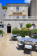 Summer cafe in the old town of Perast