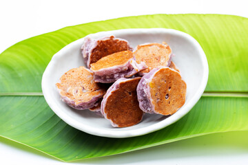 Coconut pancake on white background.