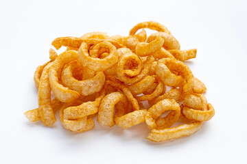 Fried crispy pork rinds on white background.