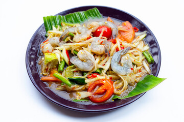 Papaya salad with shrimp in white plate