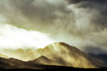 Fototapeta premium time clouds over the mountains