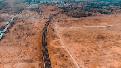 Railway viaduct over the fields. An aerial view drone photo