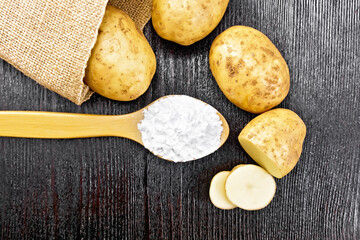 Starch potato in spoon on board top