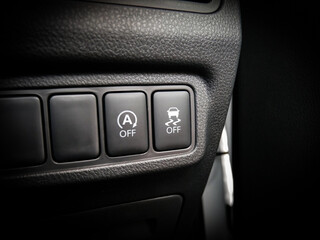 Auto Start and Stop Button and Traction Control Button in a Car