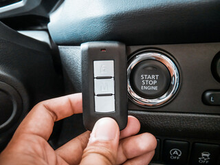 Car Immobilizer Remote Near Start Stop Engine Button - obrazy, fototapety, plakaty