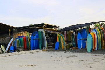 colorful surfboards on the beach