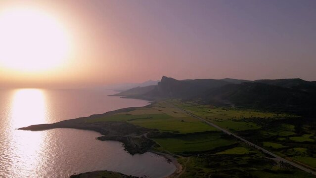 Aerial 4k coastline sunset view from mountain in North Cyprus.