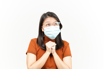 Wearing Mask Folding hand and Pray Of Beautiful Asian Woman Isolated On White Background