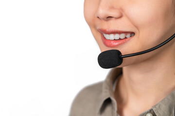 Close up of face smiling woman wear headset is customer support phone operator, Consulting service call center on grey background.