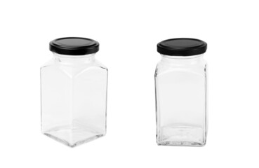 Empty glass jar with black lid isolated on a white background