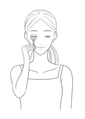 Women using eyelash curler (grayscale)