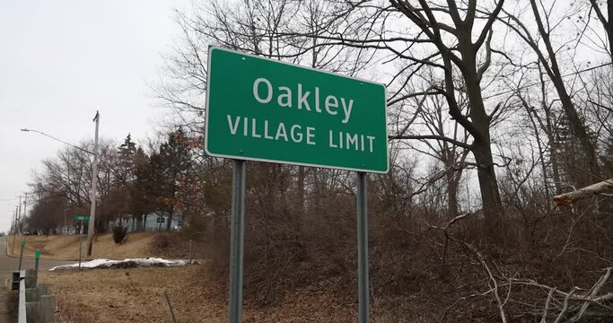 Oakley Michigan village limit roadsign.
