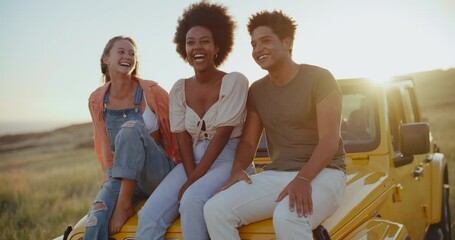 Road trip adventure, three best friends laughing and relaxing on epic road trip at sunset, freedom and travel lifestyle