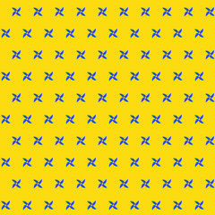 Obraz na płótnie Canvas Blue ninja weapon on yellow background. Star shape pattern.