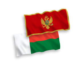 Flags of Montenegro and Madagascar on a white background
