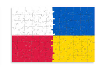 Puzzle made from Poland and Ukraine flags. Relationship between Poland and Ukraine