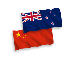 Flags of New Zealand and China on a white background