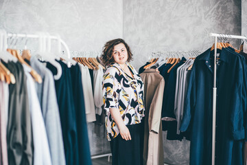  Plus Size Woman Choose Fashioned Dress in Store. Plus size women shopping.