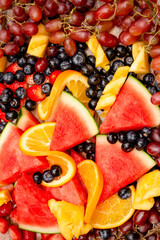 Fresh fruits concept, Healthy mix assorted fruits consist of tropical fruit and berry as background