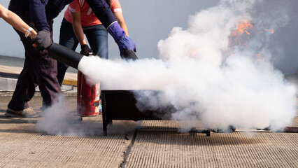 The instructor demonstrate and training the fire extinguisher use, fire evacuation and fire...