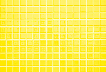 Yellow ceramic wall and floor tiles mosaic abstract background. Design geometric wallpaper texture decoration.