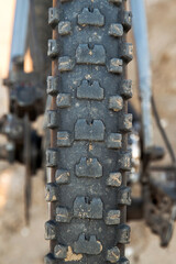 Bicycle tire with aggressive tread in the sand