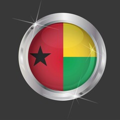 Flag of Guinea-Bissau in circle. 3D effect. Glossy and shiny button with metal frame and sparkles. Light reflection. Round Graphic design element. Isolated on gray background. Vector image EPS 10. 