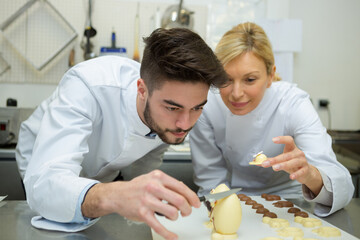 chocolatier creating easter eggs design