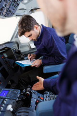 pilot student in uniform flying light craft plane © auremar