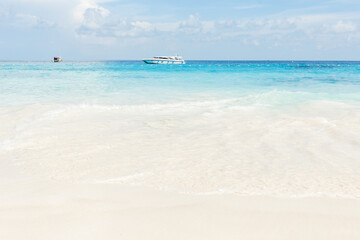 Sea view from tropical beach with sunny sky