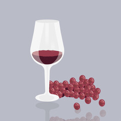 a glass of red wine,  red grapes