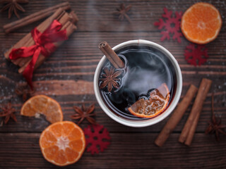 Hot tea with cinnamon and oranges / mulled wine