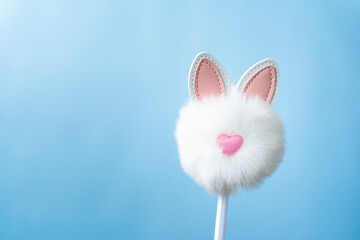 easter symbol on a blue background, the image of a rabbit