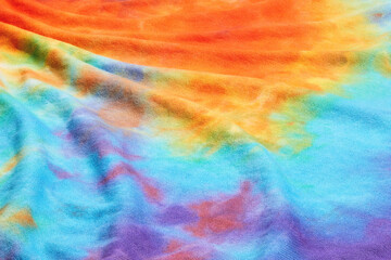 Abstract tie dye multicolor folded fabric cloth Boho pattern texture for background or groovy...