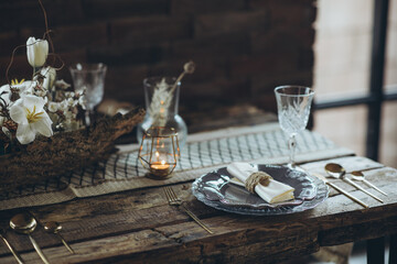 Table setting. A beautifully decorated table in a rustic style. High quality photo