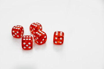 Casino and gambling concept. Five red glass dice on white background.