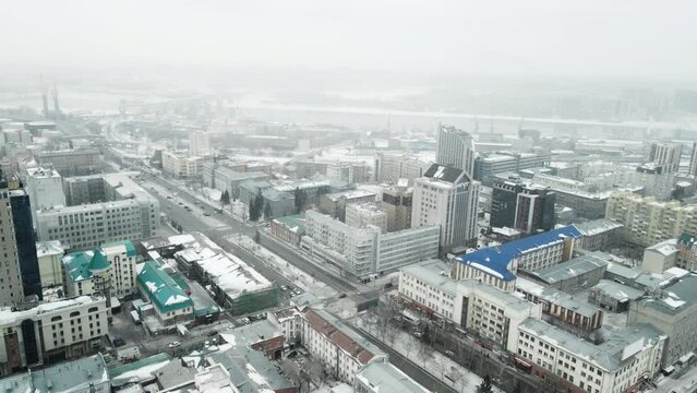 Krasny Prospekt of the city of Novosibirsk. Aerial photography in winter.
