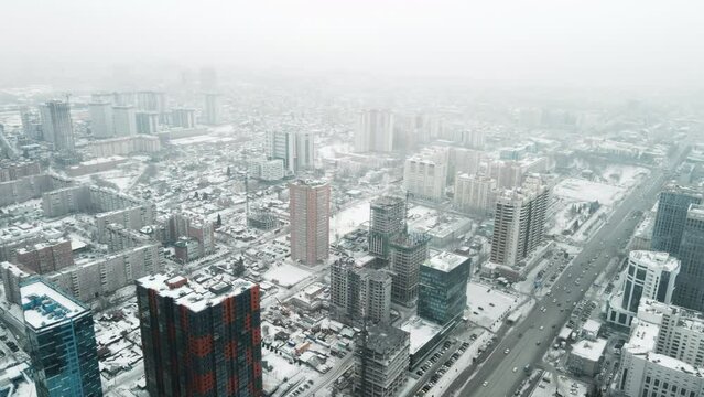 Aerial photography of a winter city in a blizzard.