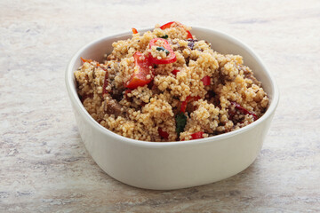 Arabic cous cous with meat and tomato