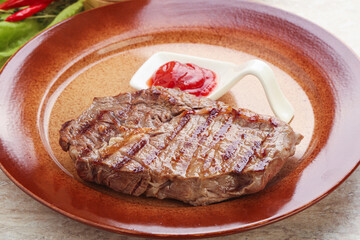 Grilled rib-eye steak beef meat