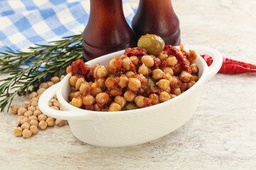 Chickpea beans with dry tomato and olives