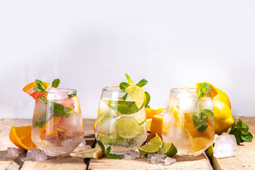 Summer healthy cocktails, mocktails. Set of various citrus lemonades mojito, with lime, lemon,...