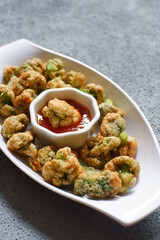 a plate of fried crispy broccoli 