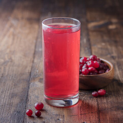 glass of cranberry juice and berries
